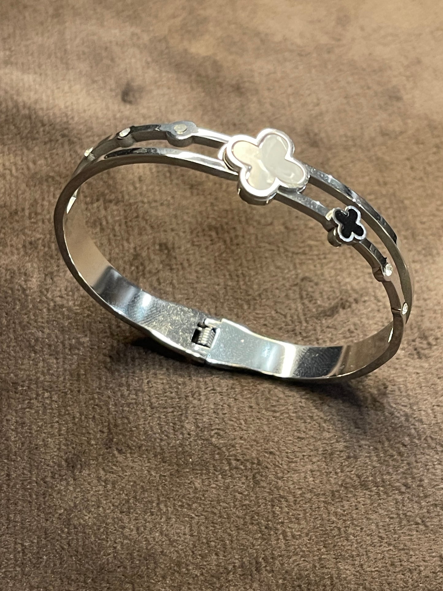 Silver Bangle with Clover Motifs