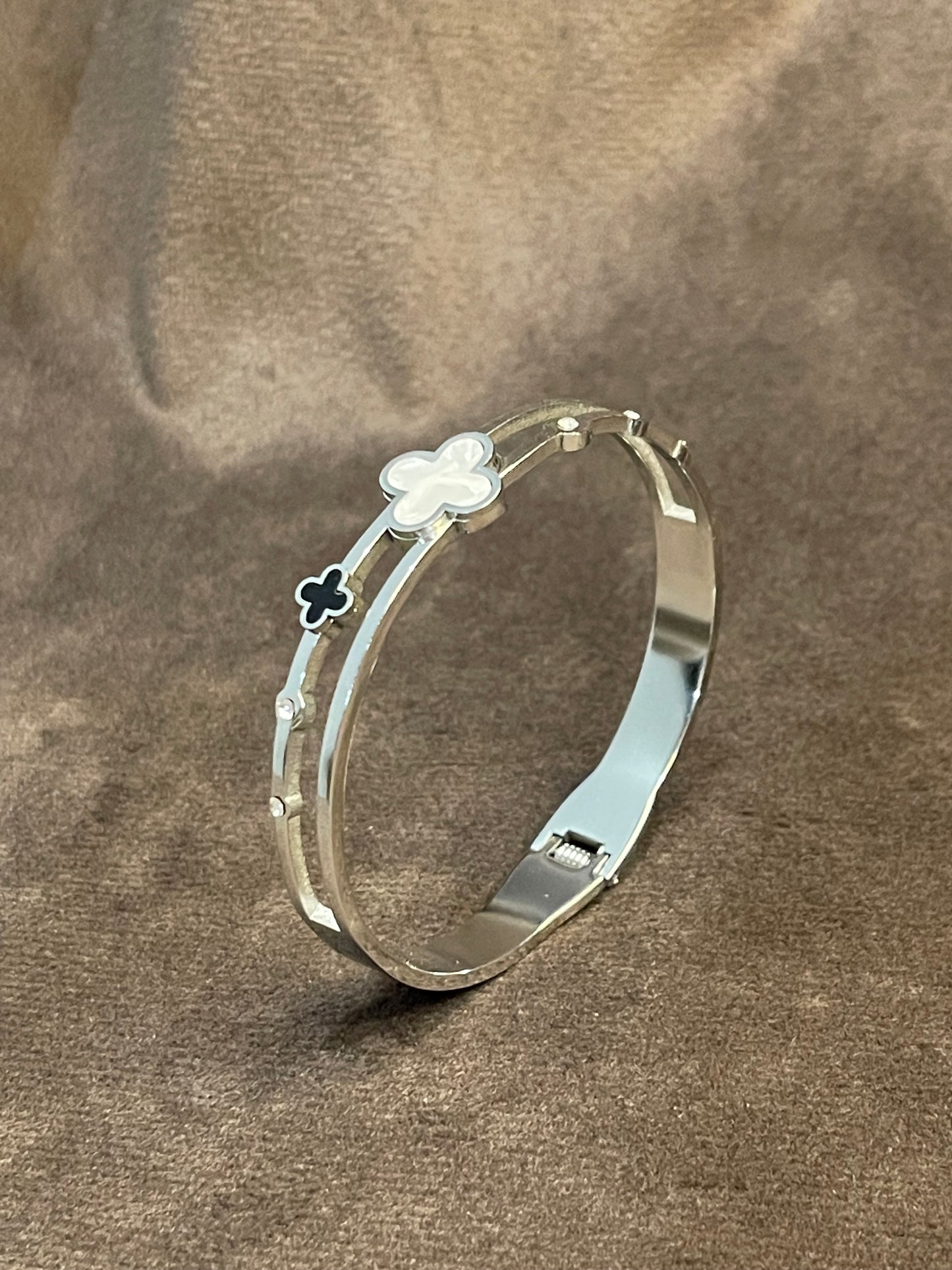 Silver Bangle with Clover Motifs