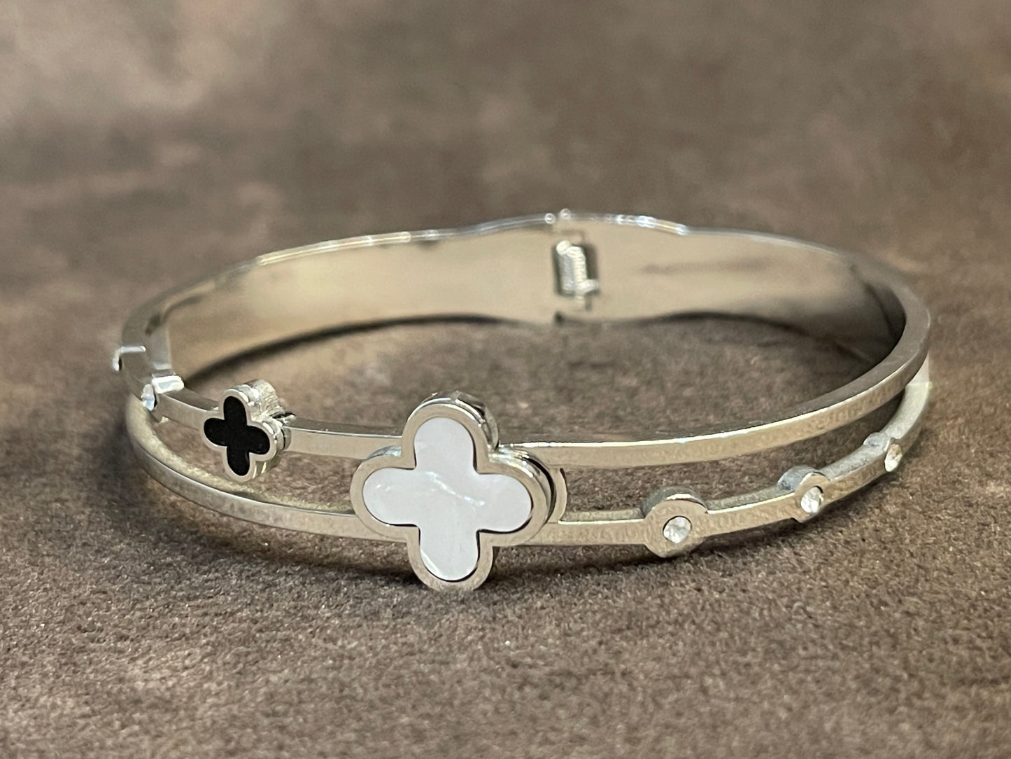 Silver Bangle with Clover Motifs