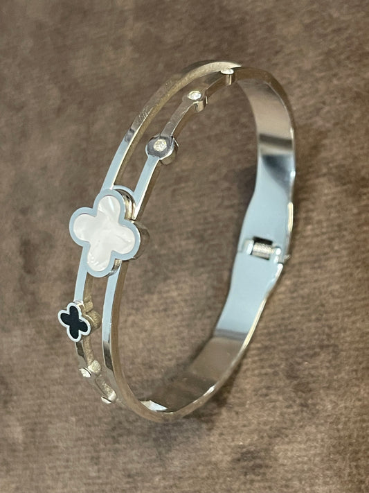Silver Bangle with Clover Motifs