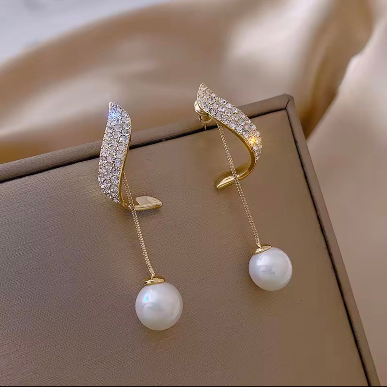 Gold Earrings with rhinestones and dangling pearls