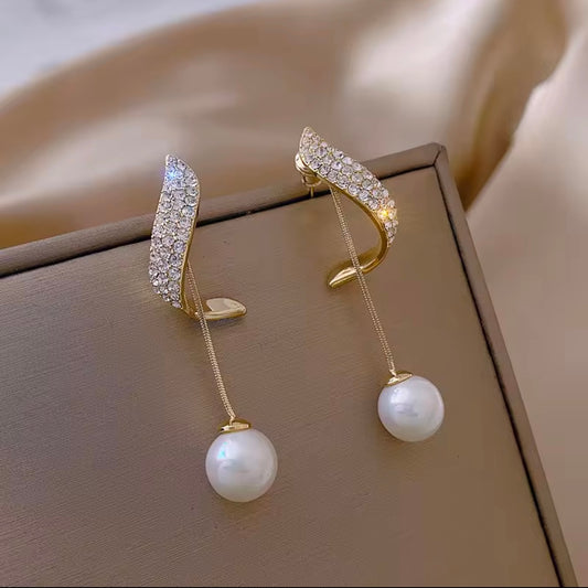 Gold Earrings with rhinestones and dangling pearls