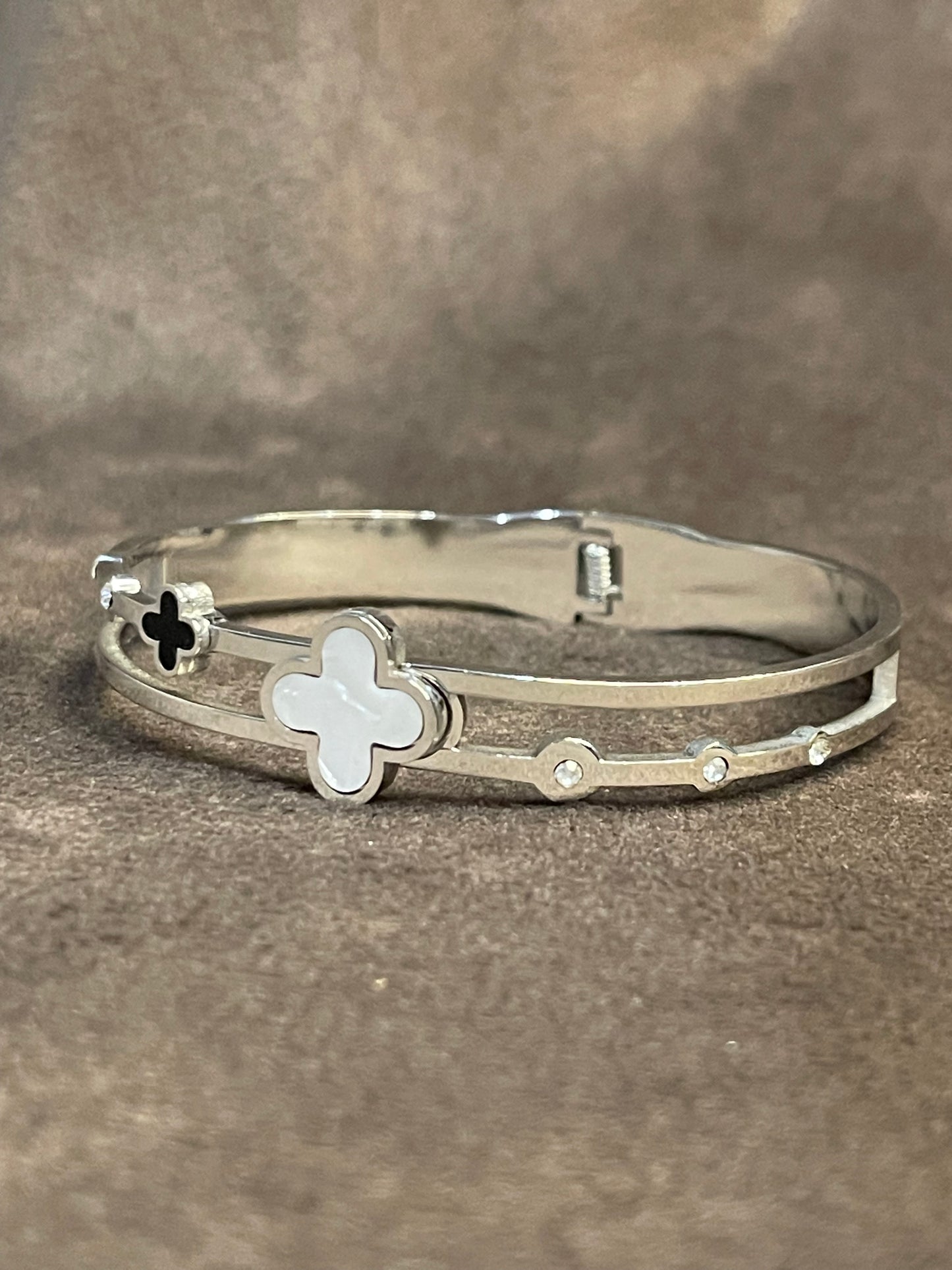 Silver Bangle with Clover Motifs